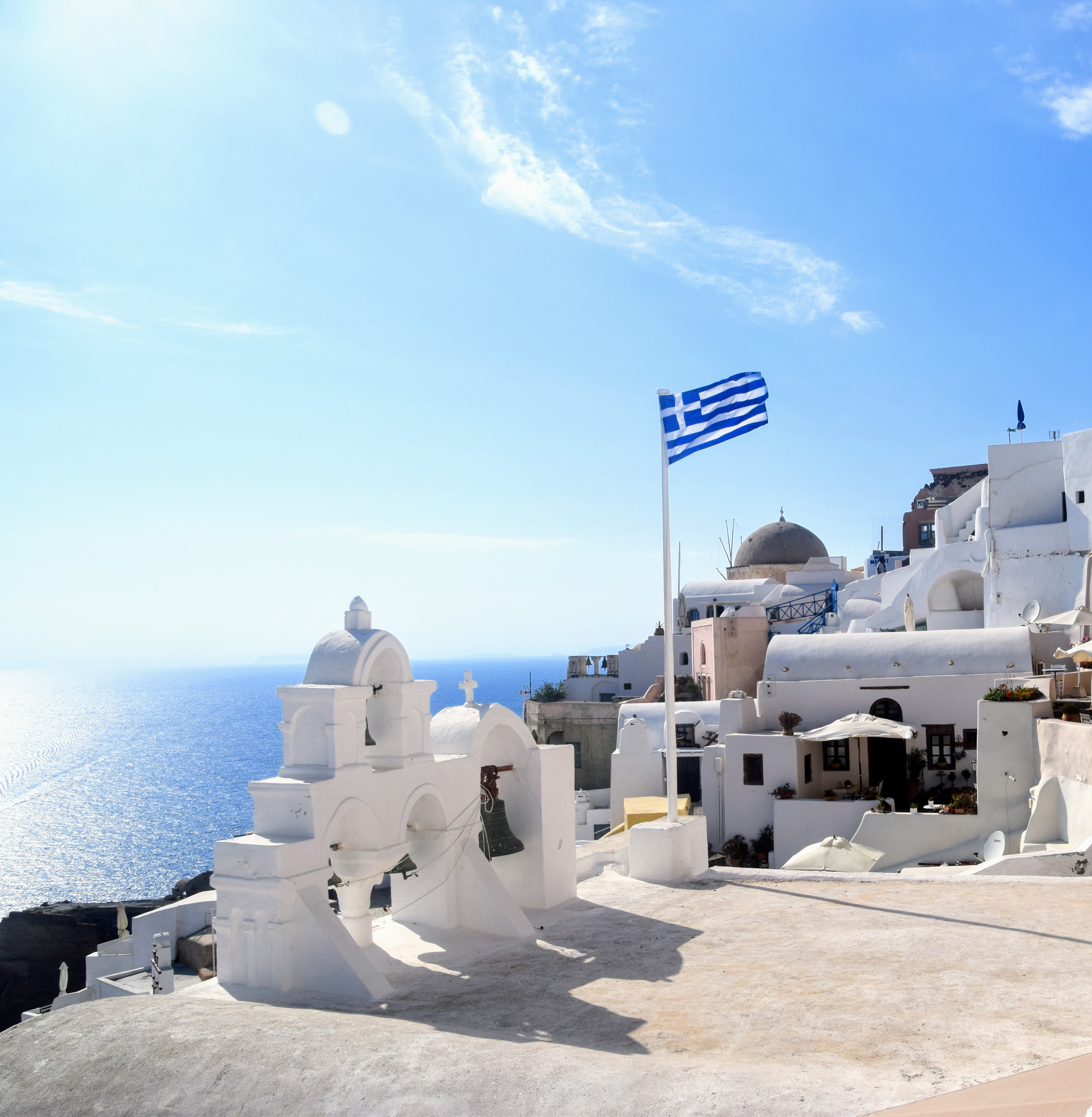 Greek flag over the sea